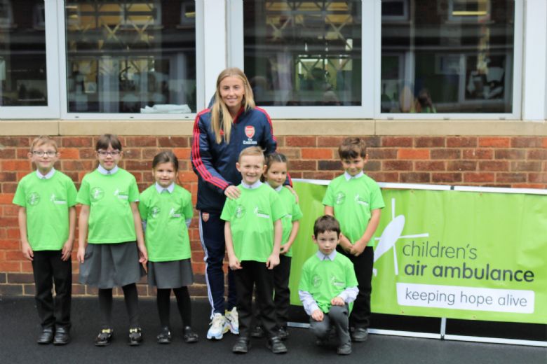 Compass Primary Academy England Lioness plays football with Compass